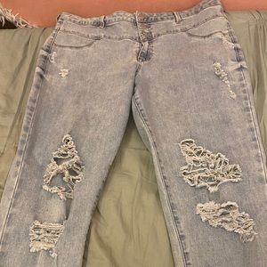 Light wash distressed high wasted jeans.